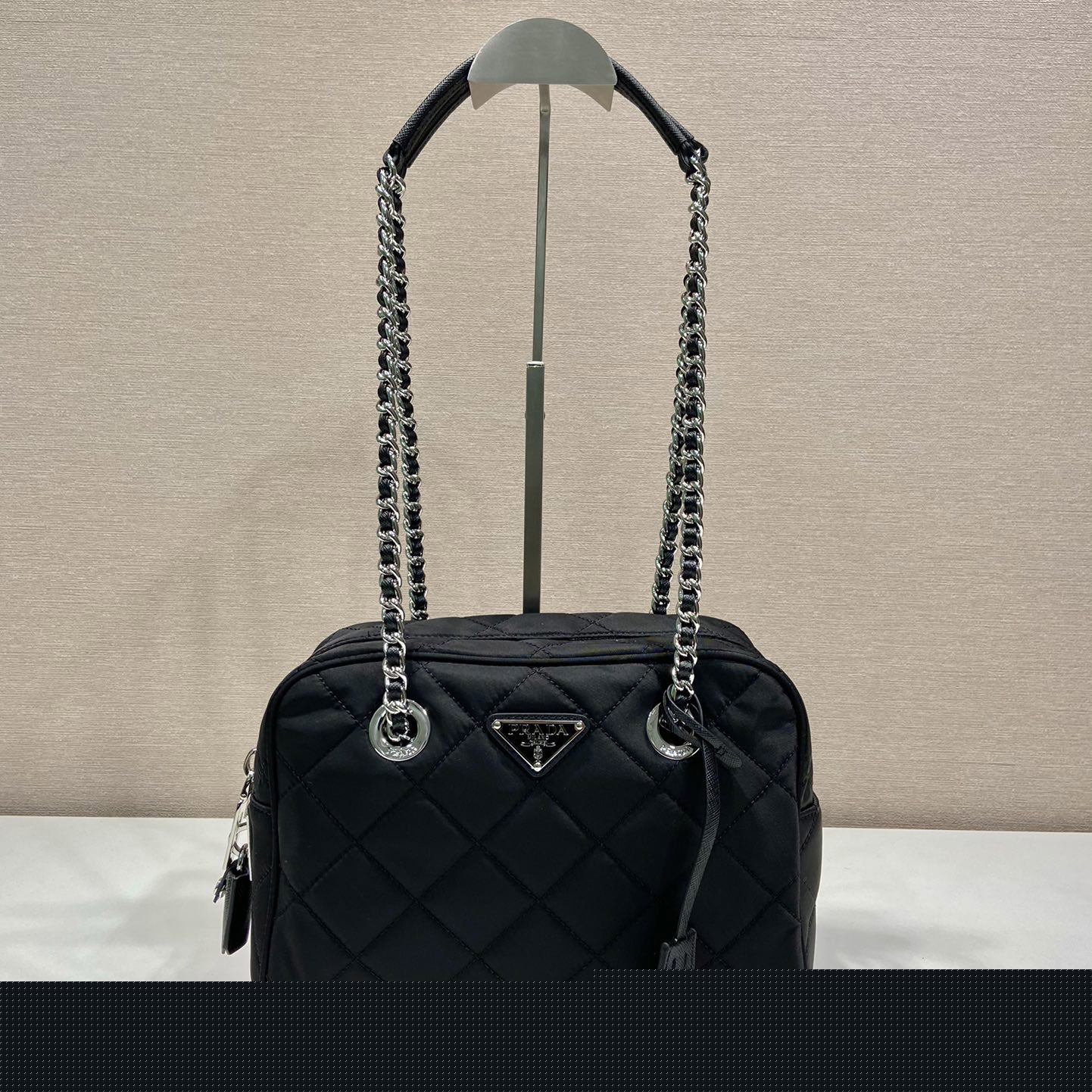 Pra*a top handle bags